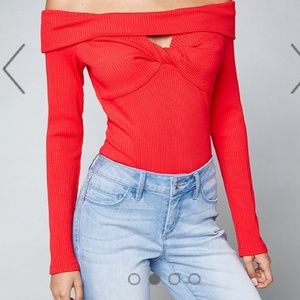 Bebe red bodysuit. Size S. Brand New